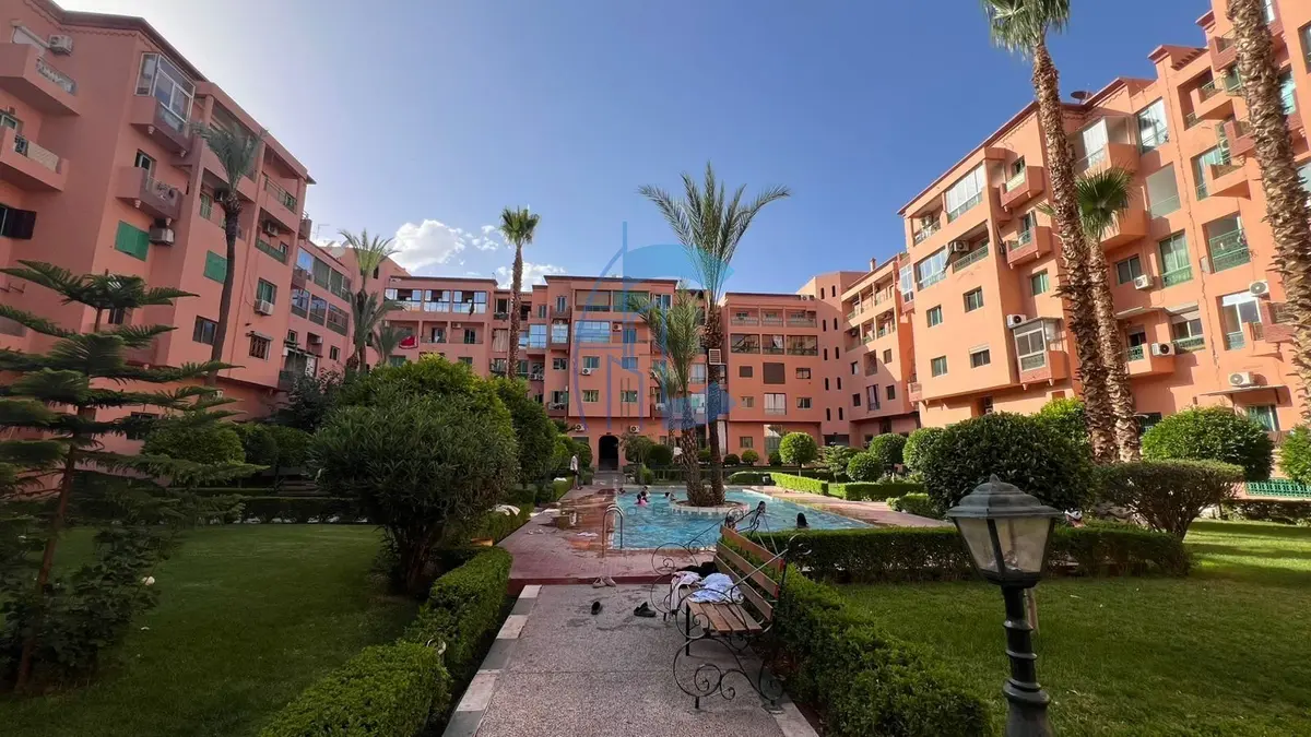 RENOVATED FURNISHED 2-BEDROOM APARTMENT WITH BALCONY AND POOL VIEW FOR RENT - SEMLALIA MARRAKECH - detail.photo 1