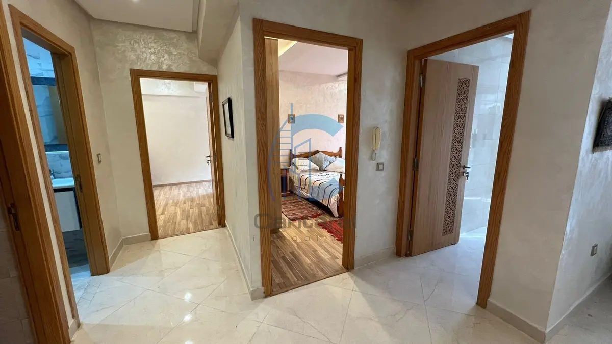RENOVATED FURNISHED 2-BEDROOM APARTMENT WITH BALCONY AND POOL VIEW FOR RENT - SEMLALIA MARRAKECH - detail.photo 3