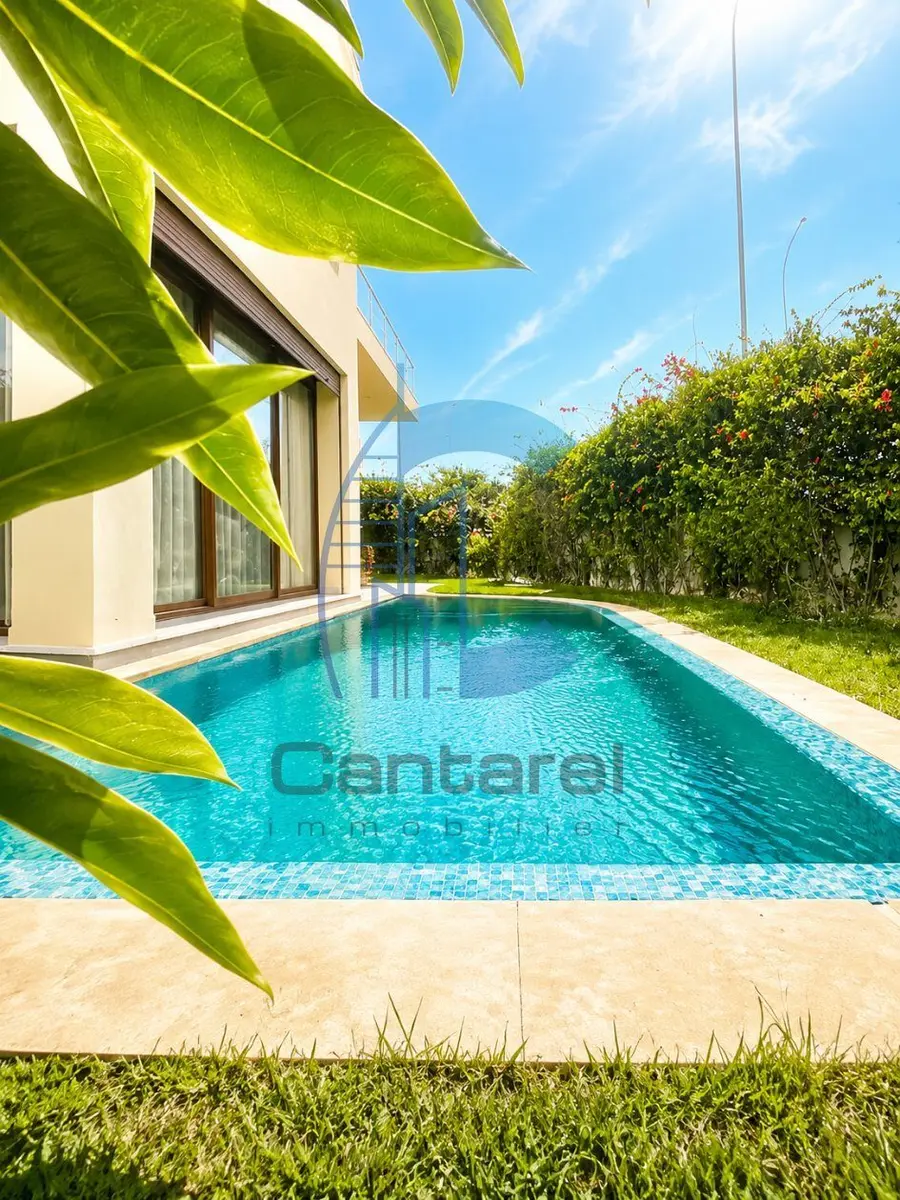 Villa à la location à Dar Bouazza dans résidence sécurisée avec piscine et jardin - Photo 12