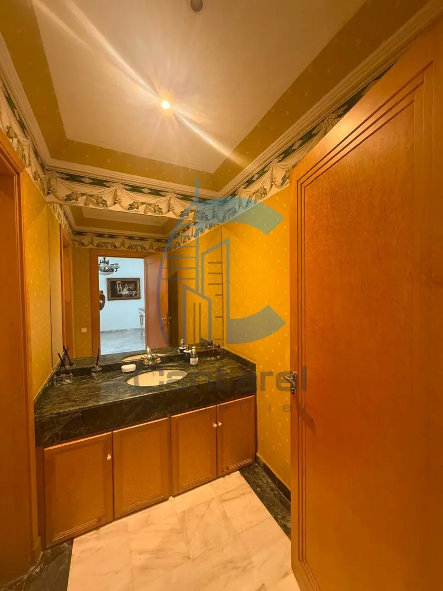 Appartement à la location dans le quartier Ghandi à Casablanca avec jardin - Photo 8